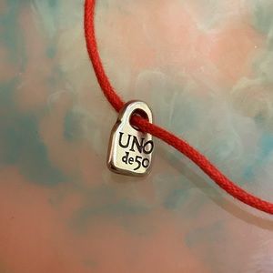 Uno de 50 red adjustable bracelet with silver charm